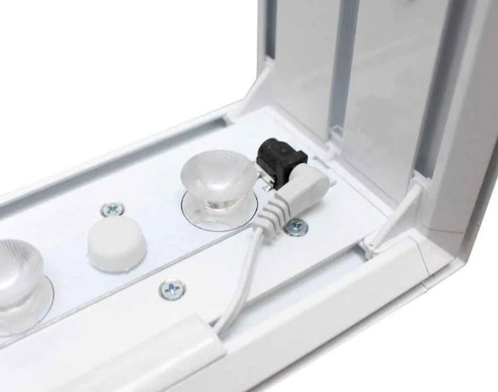 Bright LED bulbs run across the top and bottom of the frame