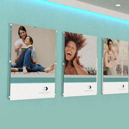 Wall mounted poster pockets in a reception