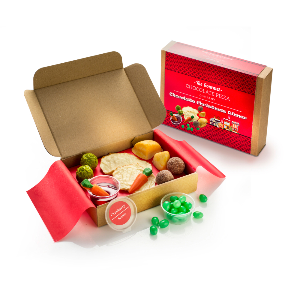 Chocolate Roast Christmas Dinner presented alongside festive red box.