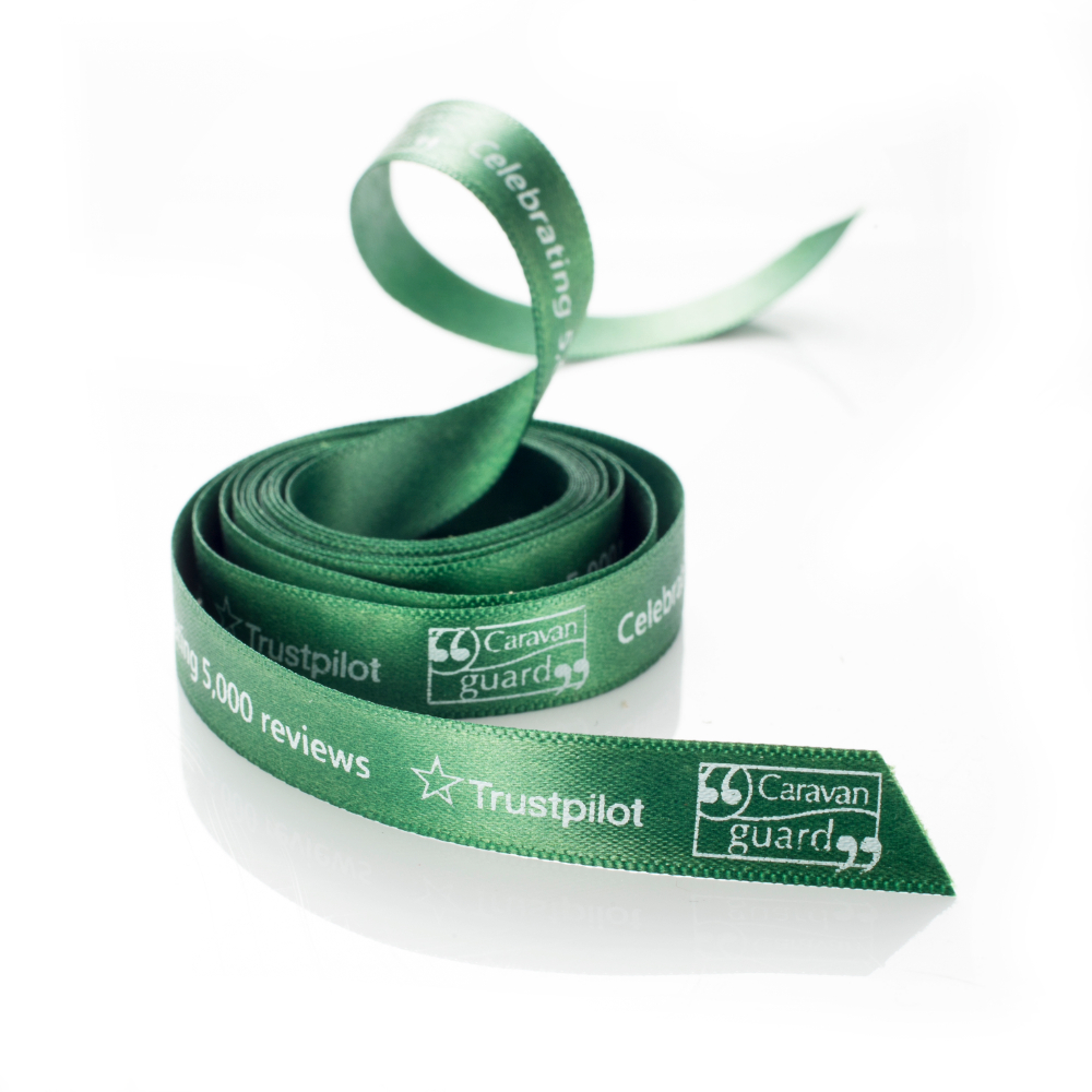 Previous bespoke ribbon we have created, with a logo and custom message.