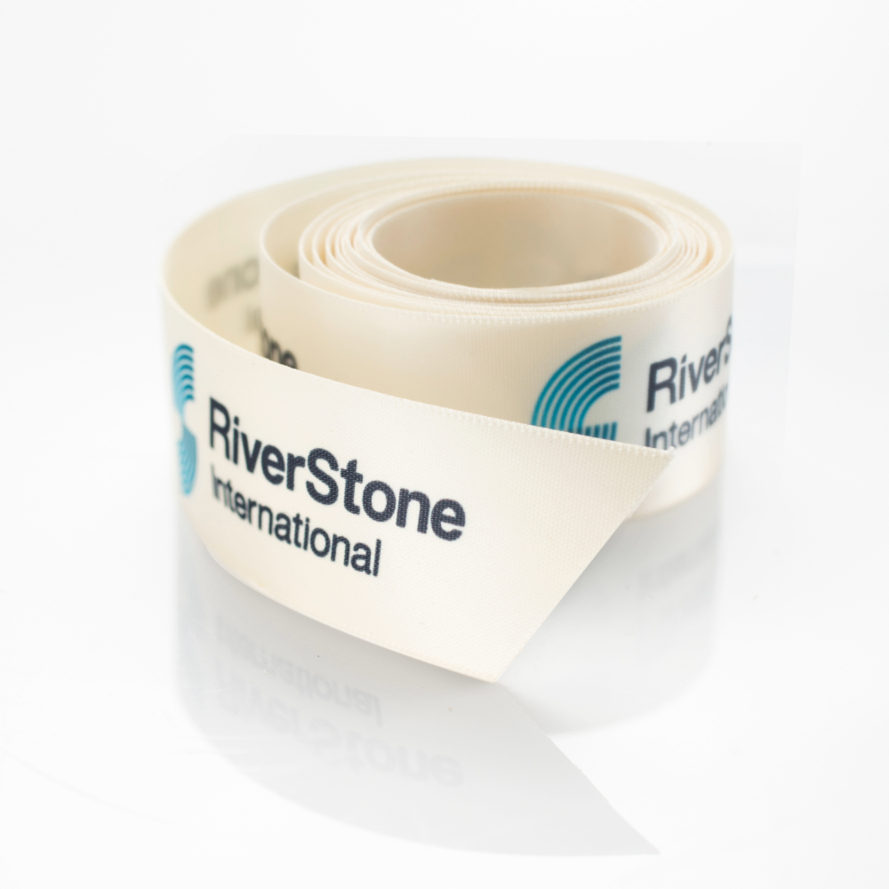 An example of a previous bespoke ribbon we have created, with a company logo.