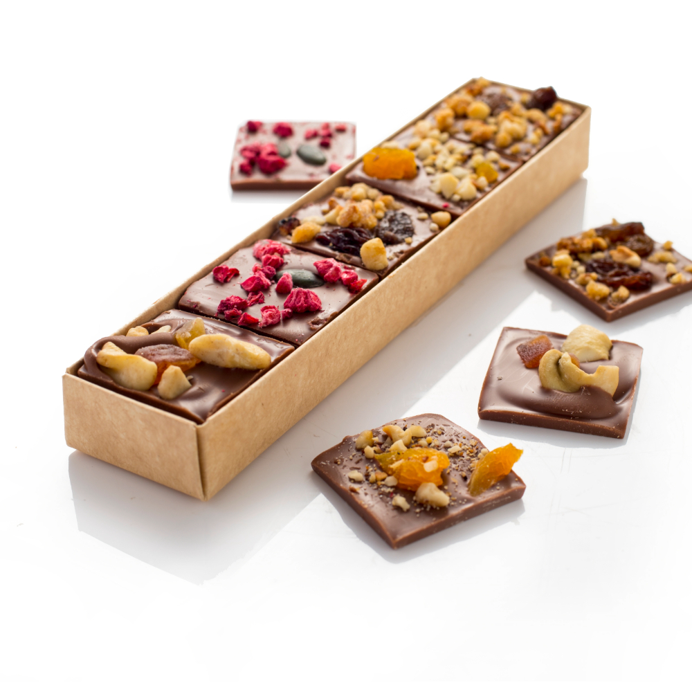Belgian chocolate squares topped with a variety of fruit and nut.